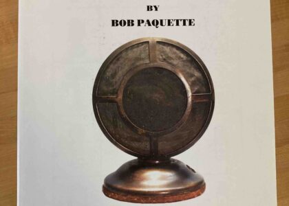 Photo of book: The History and Evolution of the Microphone by Bob Paquette